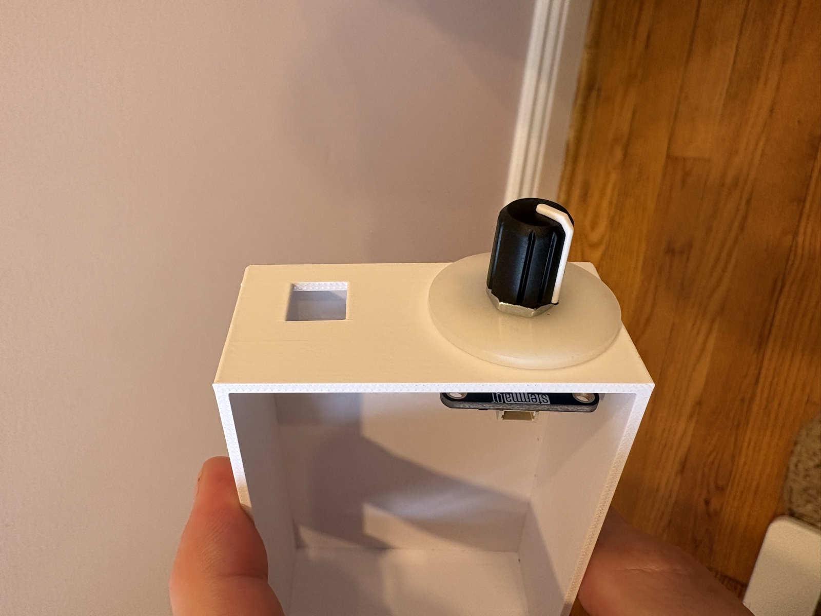 Mounting the rotary encoder breakout into the enclosure with circular collar spacer